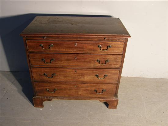 Appraisal: George III mahogany chest with brushing slide four graduated drawers