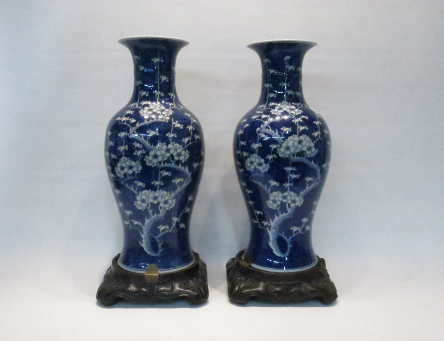 Appraisal: TWO CHINESE PORCELAIN BLUE AND WHITE BALUSTER VASES with conforming