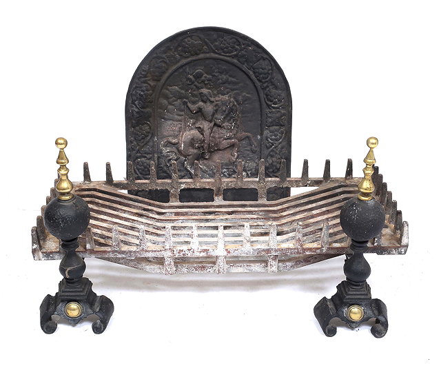 Appraisal: A CAST IRON FIRE BACK the arching fire back with