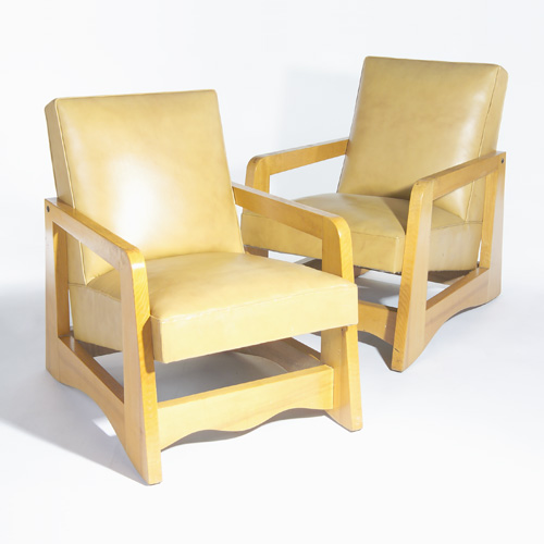 Appraisal: AMERICAN Pair of armchairs of square and scalloped blonde-wood frames