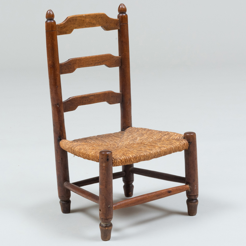 Appraisal: CHILD'S OAK AND RUSH LADDER BACK SIDE CHAIR x x