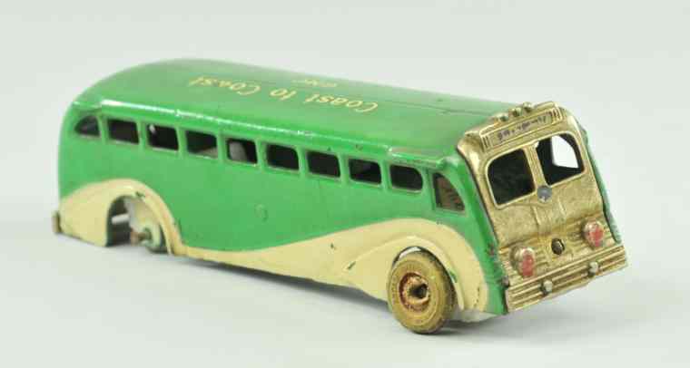 Appraisal: ARCADE GREYHOUND BUS Late 's cast iron rare green and