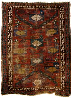 Appraisal: Pinwheel Kazak rug green and blue motifs on brick-red field