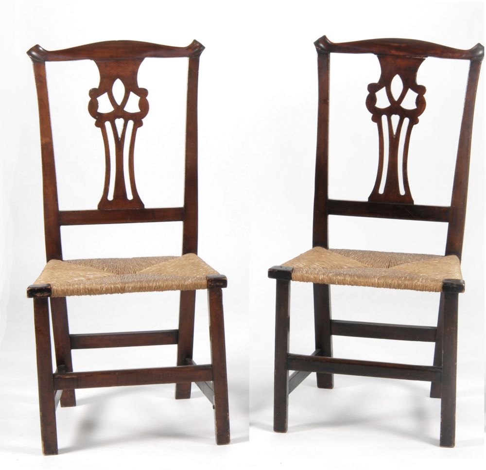 Appraisal: PAIR OF CHIPPENDALE-STYLE RUSH-SEAT SIDE CHAIRS th CenturyWith pierced splat