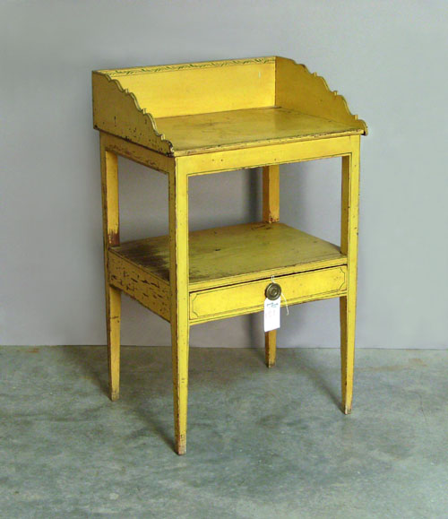 Appraisal: New England yellow painted washstand th c h w