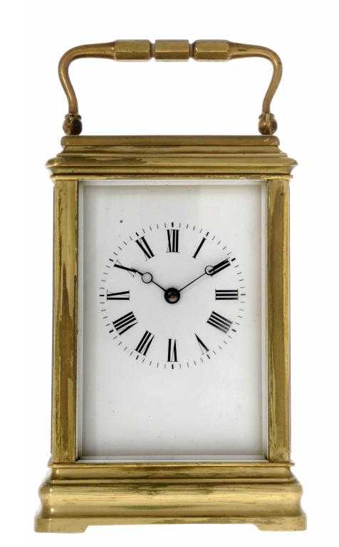 Appraisal: A FRENCH BRASS CARRIAGE CLOCK with white enamel mask dial