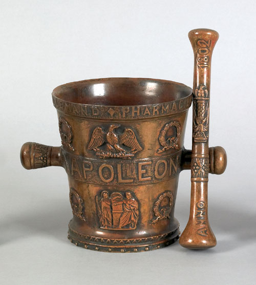 Appraisal: Bronze mortar and pestle with extensive relief decoration with wreaths