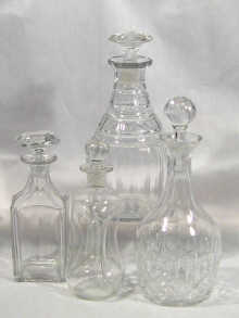 Appraisal: A mixed lot comprising four cut glass decanters ranging in