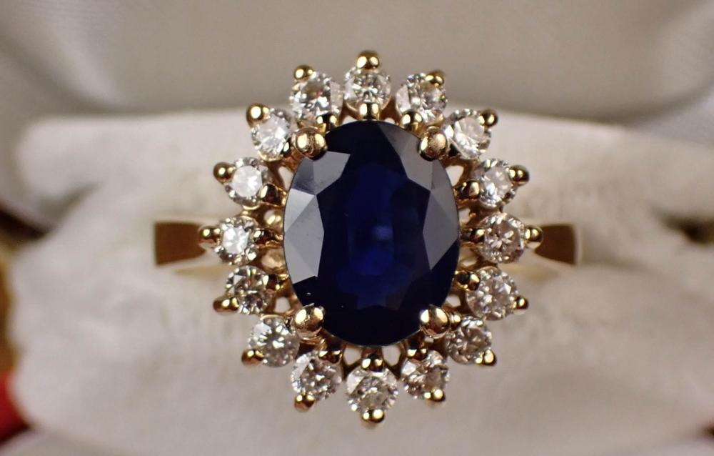 Appraisal: VINTAGE SAPPHIRE DIAMOND AND FOURTEEN KARAT GOLD EFFY RING with