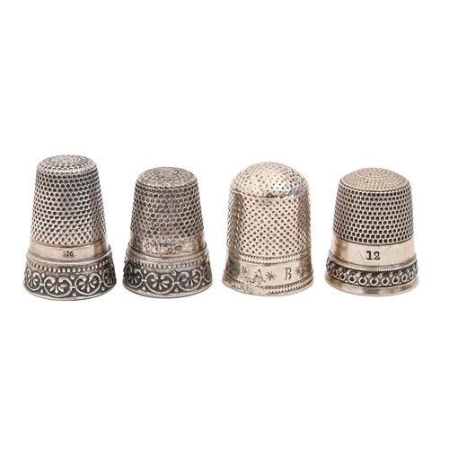 Appraisal: Three Continental silver thimbles th c mm h and smaller