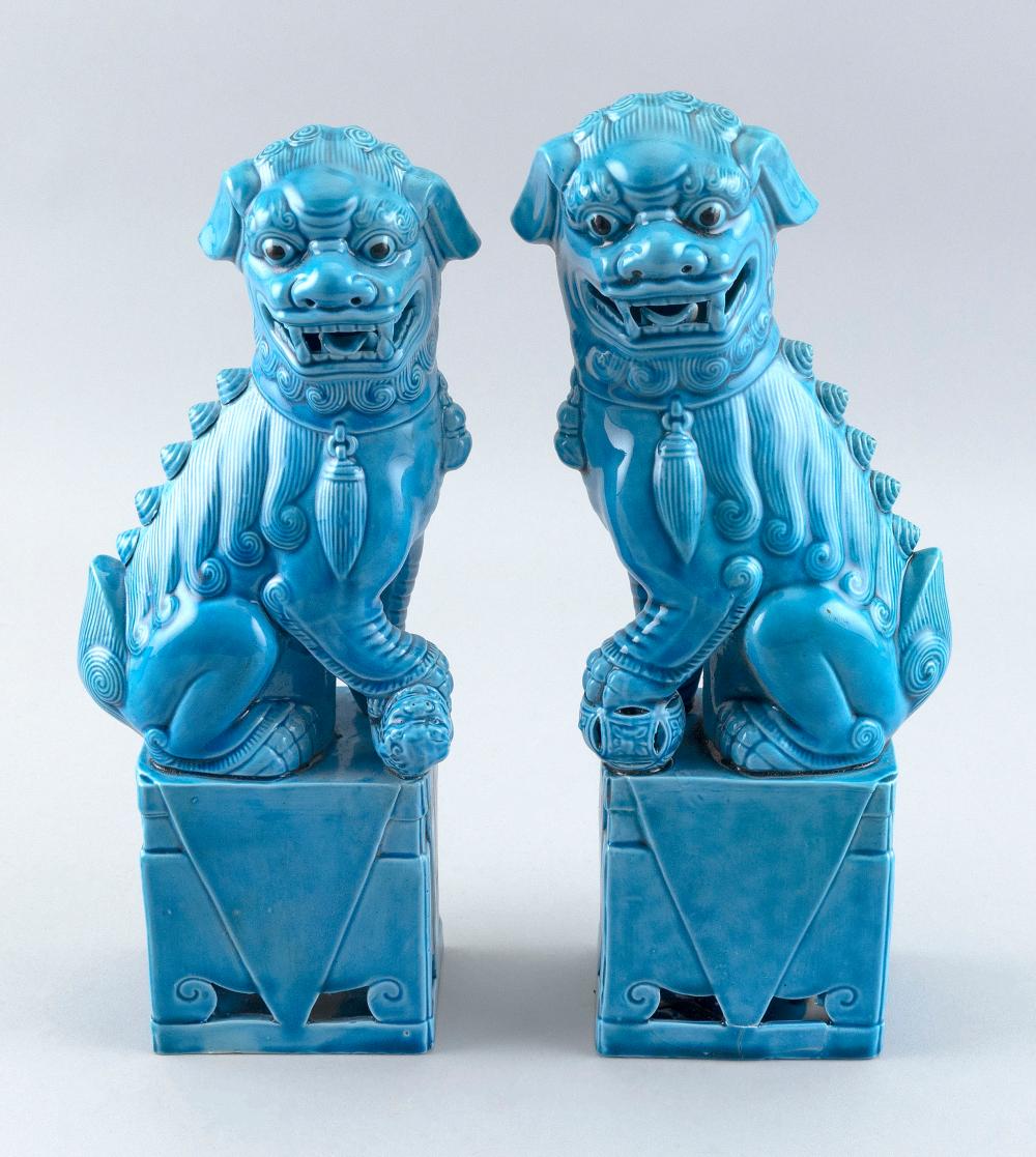 Appraisal: PAIR OF CHINESE TURQUOISE GLAZE PORCELAIN FU DOGS TH CENTURY