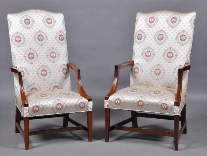 Appraisal: TWO SIMILAR FEDERAL MAHOGANY LOLLING CHAIRS Each raked padded back