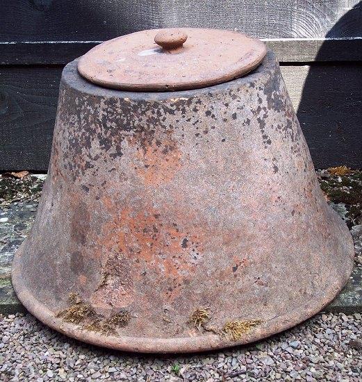 Appraisal: A bell shaped terracotta rhubarb forcer with lid cm high