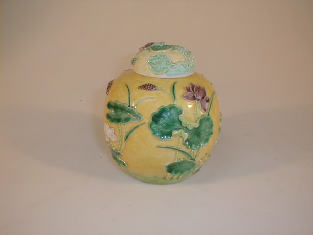 Appraisal: A Chinese famille jeune ginger jar decorated in relief with