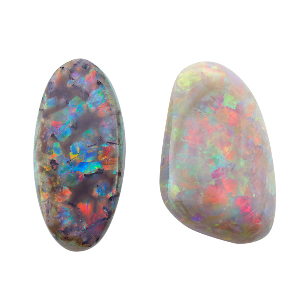 Appraisal: Two Unmounted Opals One oval one fancy-shaped opals ap cts