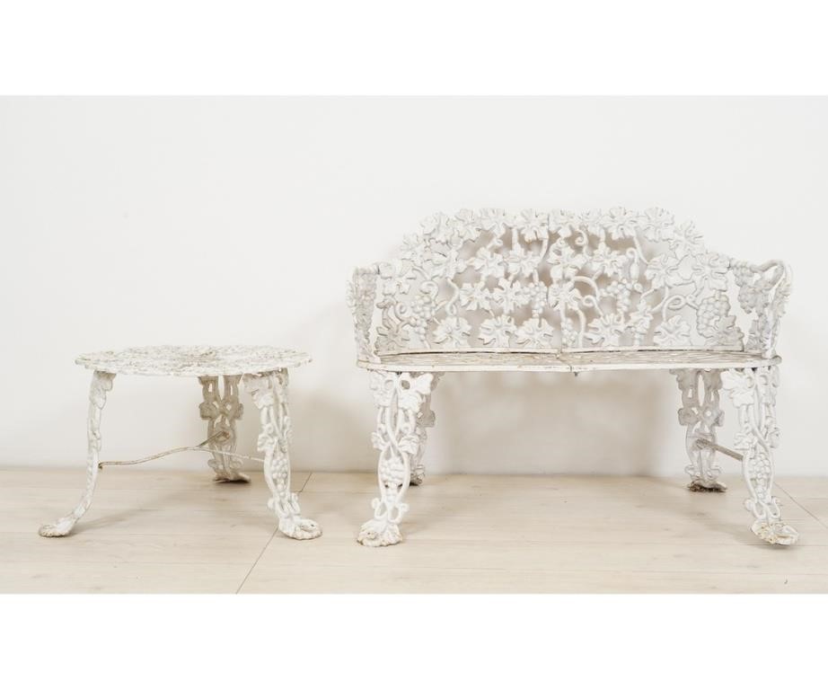 Appraisal: White cast iron grape vine pattern garden bench and table