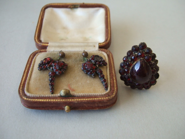 Appraisal: A pair of Bohemian garnet pendant earrings cased and a