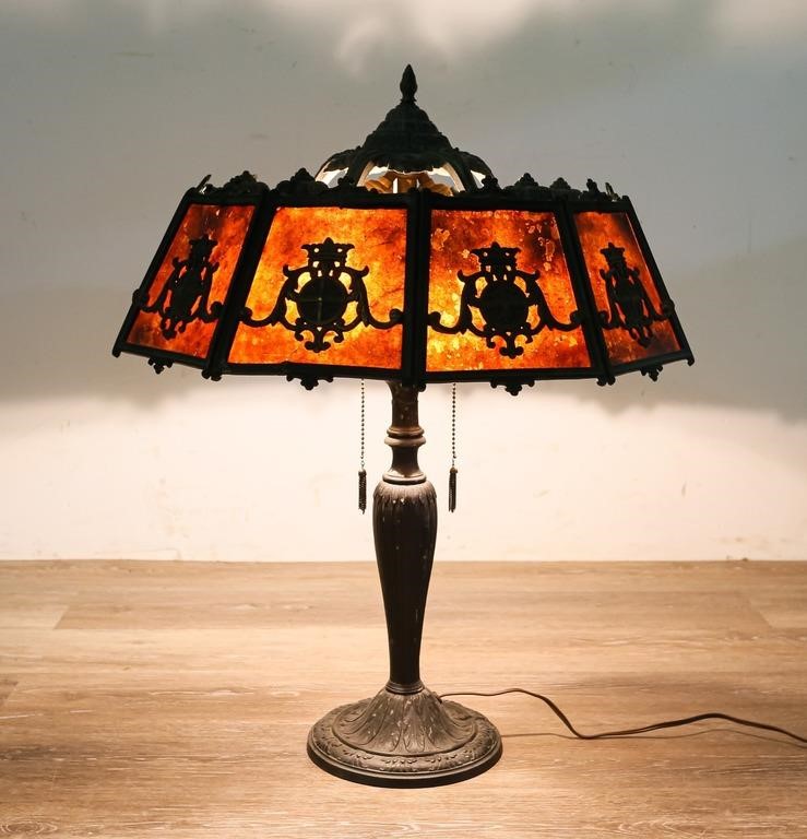 Appraisal: Art Deco table lamp with mica shade Decorated with coat