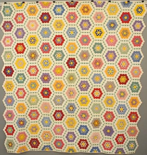 Appraisal: Grandmother's Flower Garden patchwork quilt A circa Grandmother's Flower Garden