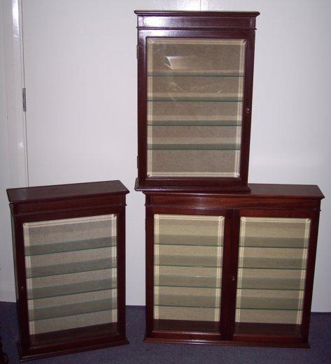 Appraisal: A pair of display cases of narrow proportions cm wide