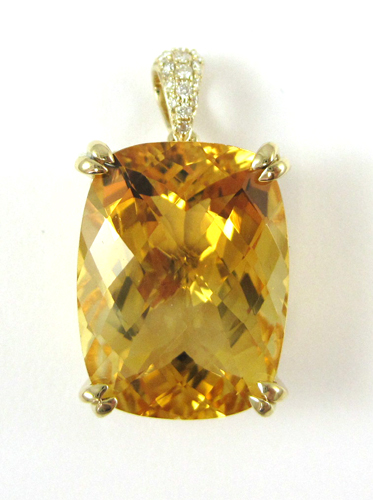 Appraisal: CITRINE DIAMOND AND FOURTEEN KARAT GOLD PENDANT featuring a checkerboard-cut