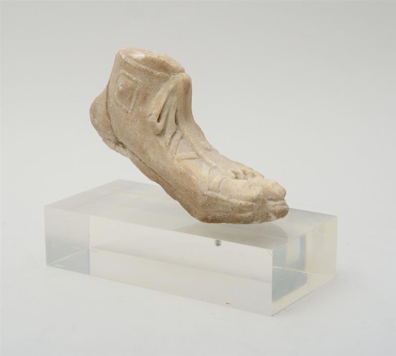 Appraisal: ITALIAN CARVED MARBLE MODEL OF A SANDALED FOOT PROBABLY ROMAN