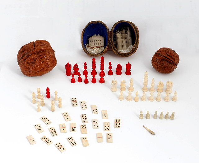 Appraisal: A MINIATURE TURNED BONE CHESS SET within an old walnut