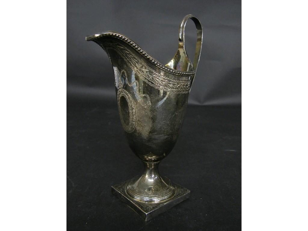 Appraisal: Victorian silver tapered baluster cream jug upon a square plinth