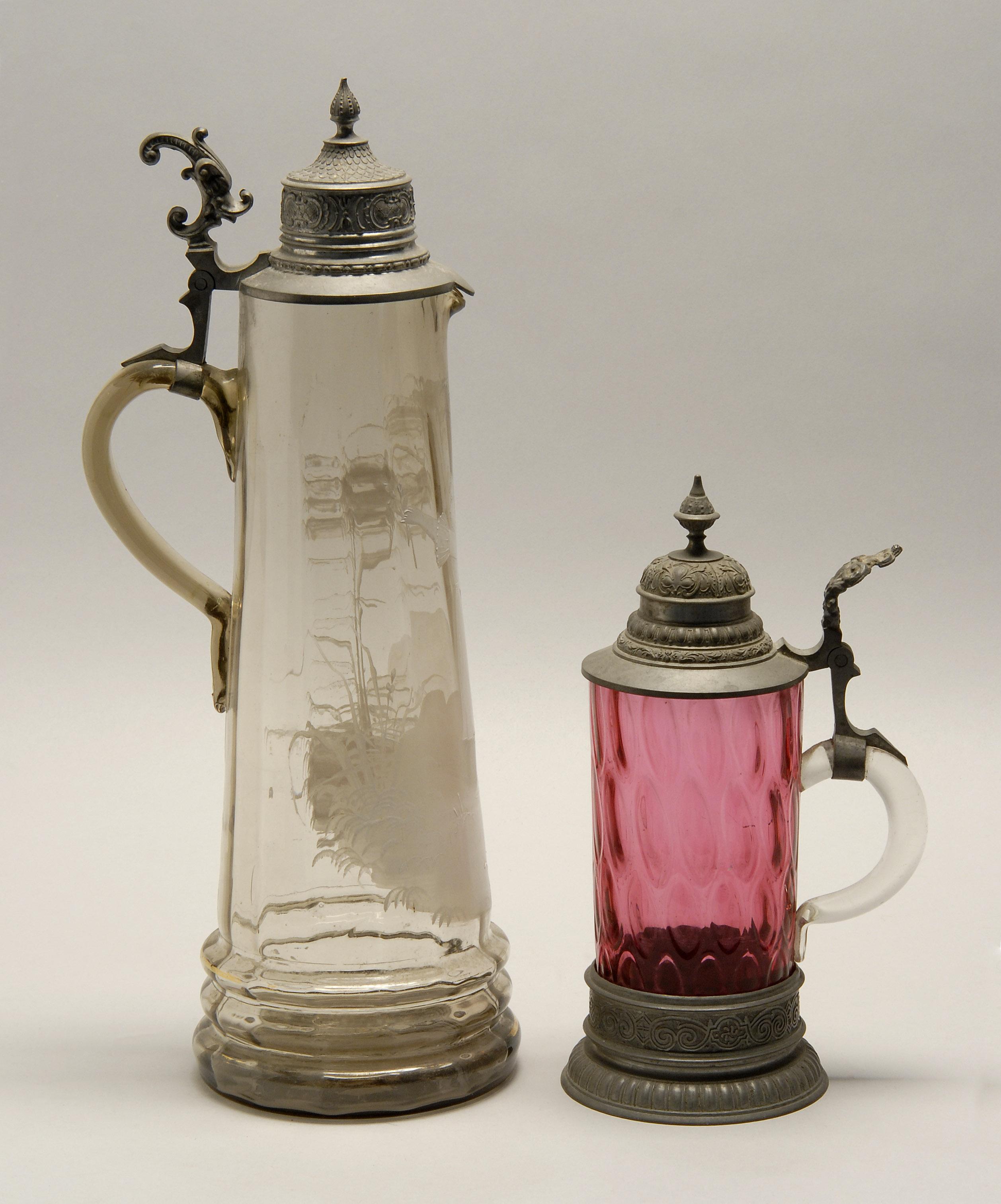 Appraisal: TWO PEWTER-MOUNTED GLASS STEINS Continental Late th Early th CenturyOne