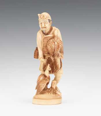 Appraisal: A Carved Ivory Figure of a Cormorant Fisherman This fine