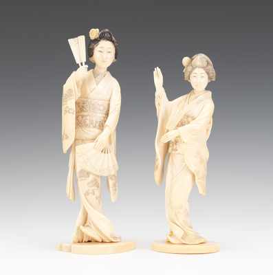 Appraisal: Two Ivory Maiden Figurines with Fans Carved ivory figurines of