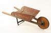 Appraisal: TOY - Circa child's tin toy wheelbarrow painted in red