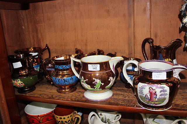 Appraisal: A COLLECTION OF TEN VICTORIAN LUSTRE WARE JUGS one decorated