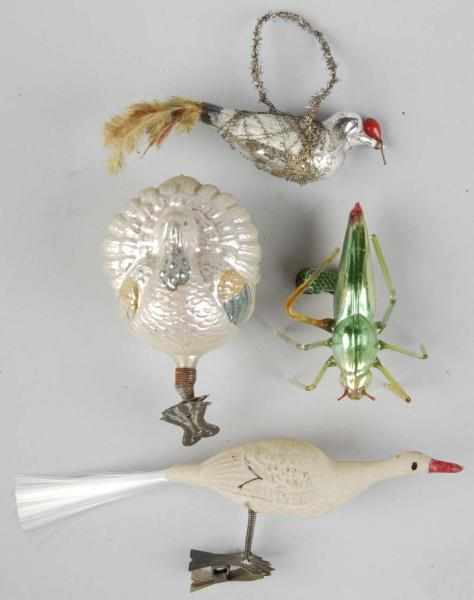 Appraisal: Lot of Glass Christmas Figural Ornaments Description Includes two birds