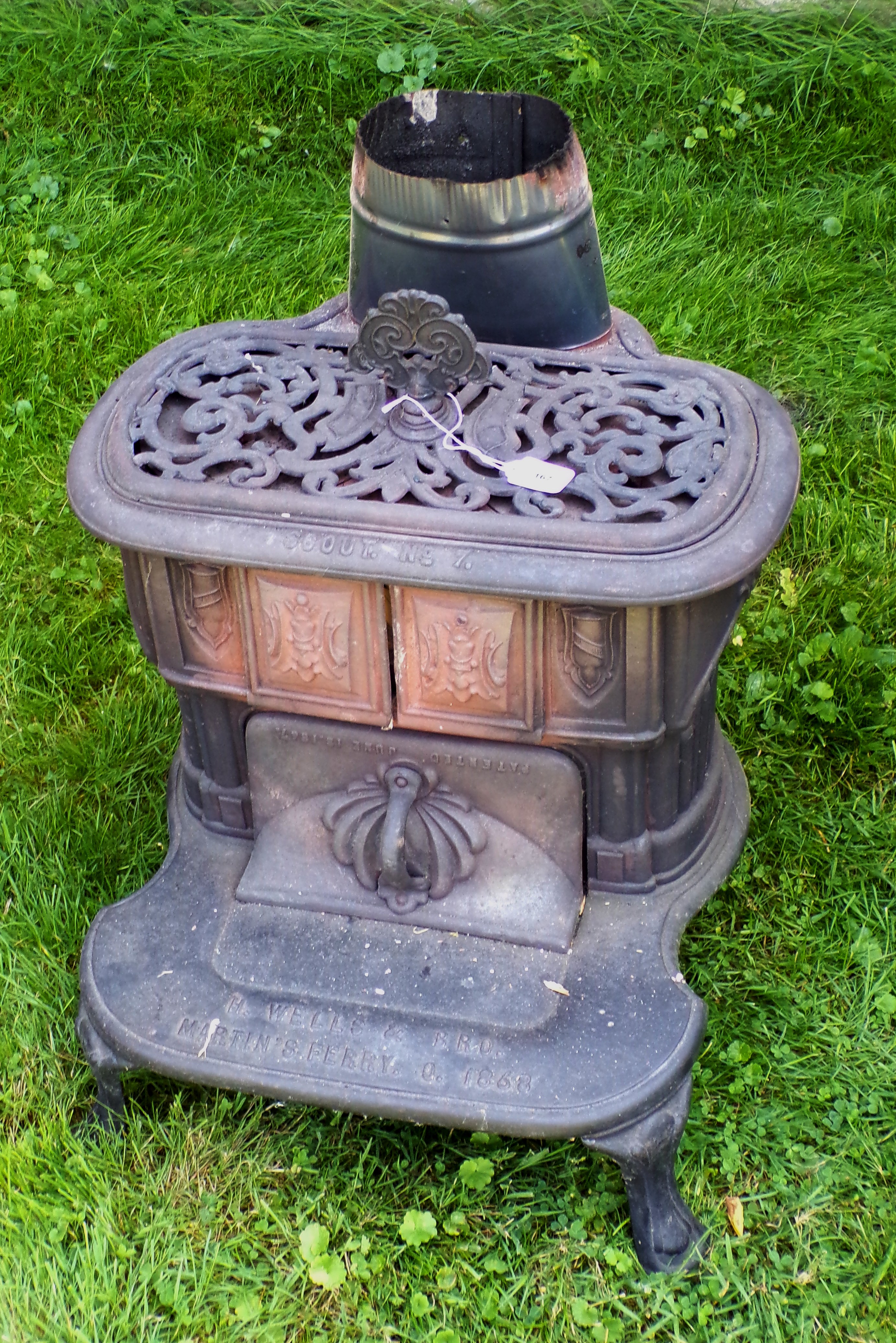 Appraisal: Cast iron stove Scout No H Wells and Bro Martin's