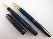 Appraisal: A navy blue Swan Mabie Todd side lever fountain pen