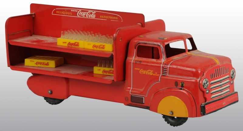 Appraisal: Tin Coca-Cola Truck with Bottles Description s Some light marks