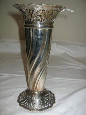 Appraisal: AN EDWARDIAN VASE of flared cylindrical form with scroll pierced