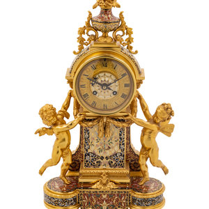 Appraisal: A French Gilt Bronze and Champlev Clock Garniture Retailed by