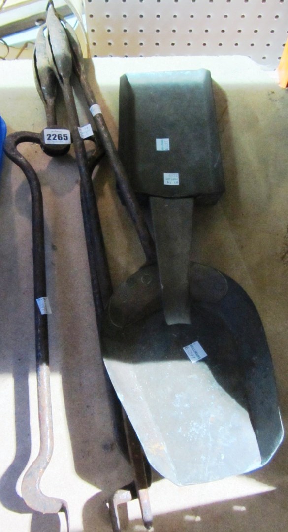 Appraisal: A set of Arts Crafts fire irons