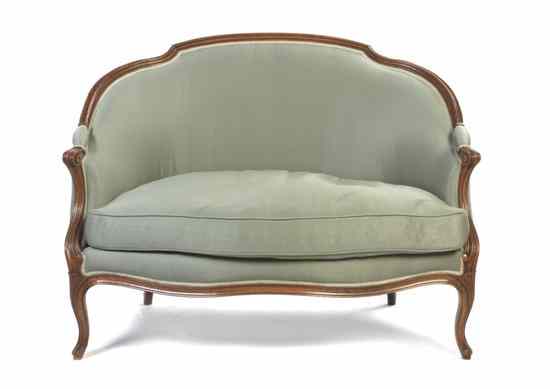 Appraisal: A Louis XV Style Walnut Settee having a shaped crestrail