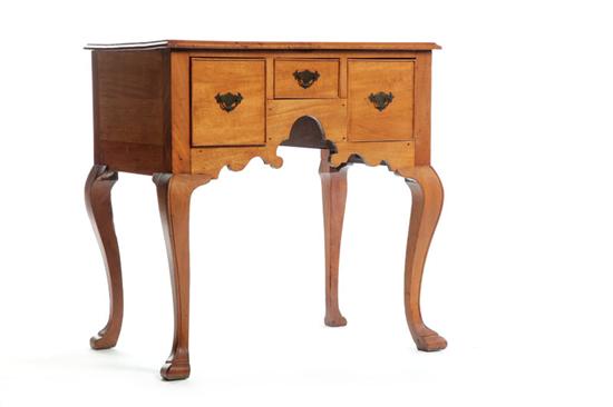 Appraisal: DRESSING TABLE England th century mahogany with oak secondary Three