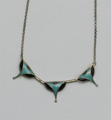 Appraisal: A Continental enamelled metal necklace three panel form enamelled green