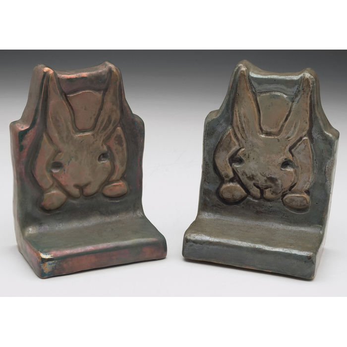 Appraisal: Pewabic bookends pair carved rabbit design covered in a metallic