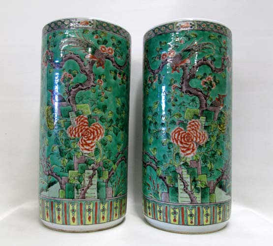 Appraisal: PAIR OF CHINESE PORCELAIN UMBRELLA STANDS having green glazed ground