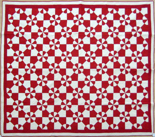 Appraisal: Pennsylvania red and white pieced quilt ca in a flower