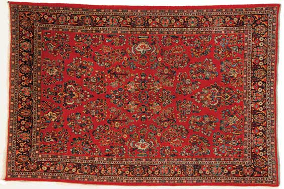 Appraisal: SEMI-ANTIQUE PERSIAN RUG Semi-antique Persian Sarouk wool rug with red