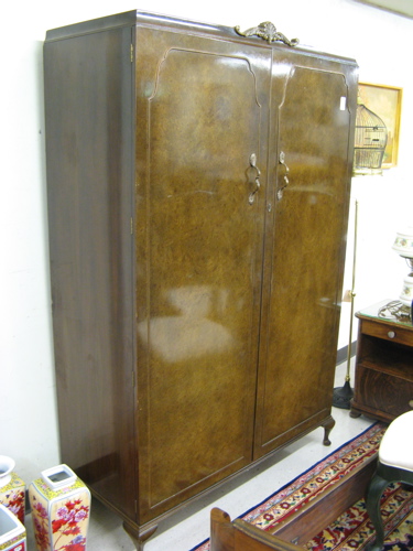 Appraisal: WALNUT AND BURL WALNUT DOUBLE-DOOR WARDROBE English mid th century