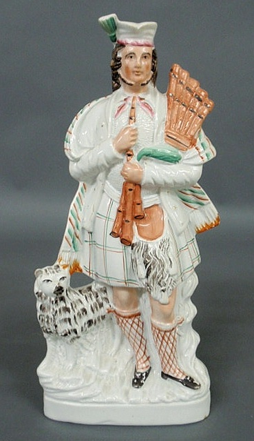 Appraisal: Staffordshire figure of standing bagpiper c h