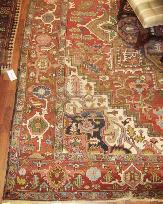 Appraisal: HERIZ antique Red ground with a central medallion and white